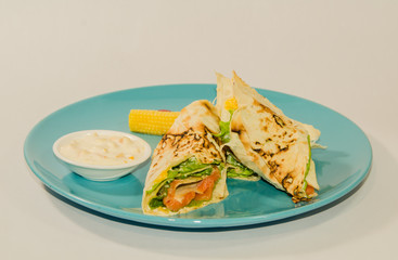 delicious rolls with greens and salmon