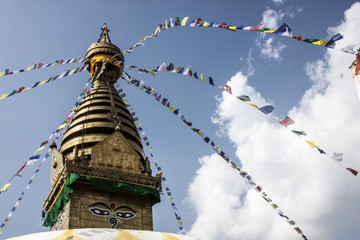 Boudhanath Temple in Kathmandu with the flags in the wind