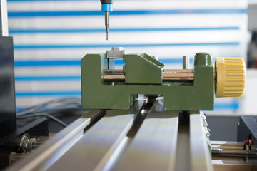 CNC milling machine processing plastic detail.Cutting plastic  modern processing