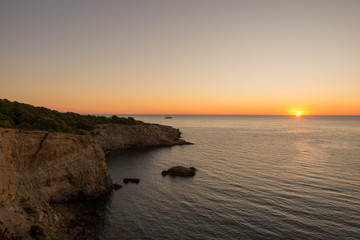 Obraz premium Sunrise at the Cala Sa Punta in Ibiza