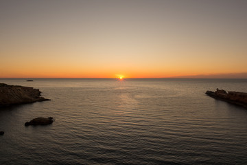 Fototapeta premium Sunrise at the Cala Sa Punta in Ibiza
