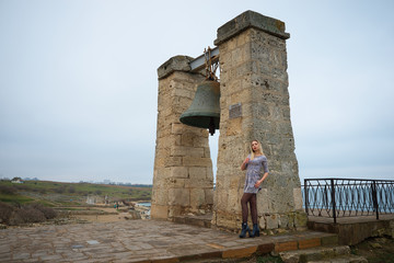 Young hot sexy woman in a short dress outdoors