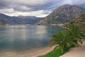 Fototapeta na wymiar Beautiful Mediterranean landscape on cloudy winter day. Montenegro, view of Bay of Kotor ( Adriatic Sea )