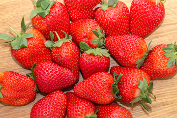 Strawberries fruit isolated on wooden background 4