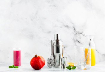 preparation of a drink, a cocktail on a marble table. all the necessary tools, utensils and ingredients. copy space