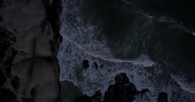 4K high quality aerial video footage of Western Cape's coast, Paternoster beach boulders, sandy sea front and Atlantic Ocean views in the background near Cape Town, South Africa on summer morning