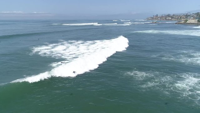 Aerial view of ocean surfing
