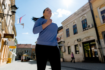 Young woman running