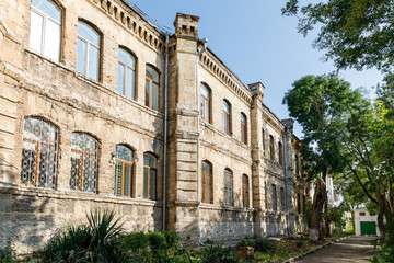 Fototapeta na wymiar architecture of Sevastopol. The building of the former Konstantinovskaya present school on a summer day
