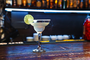 Fresh alcohol coctail on bar counter 