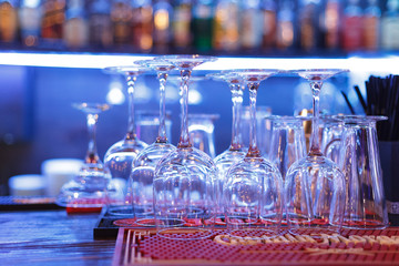 Glass wineglasses on bar counter
