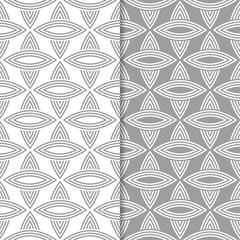 Fototapeta na wymiar Gray and white geometric ornaments. Set of seamless patterns