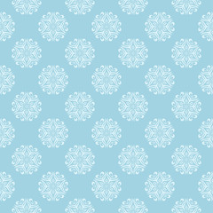 White floral seamless pattern on blue background