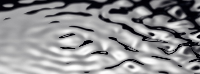 Movement of water - Abstract Black Background Liquid Texture. liquid abstraction