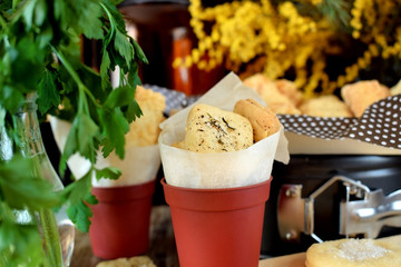 Crackers with salt and spices in tiny portion buckets