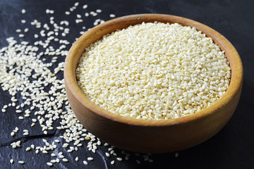 Sesame seeds in wooden bowl