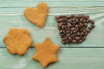 A cup of coffee made from grains, homemade cookies for breakfast on a wooden background, top view