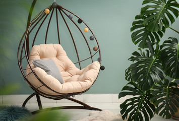 Stylish interior design with tropical leaves