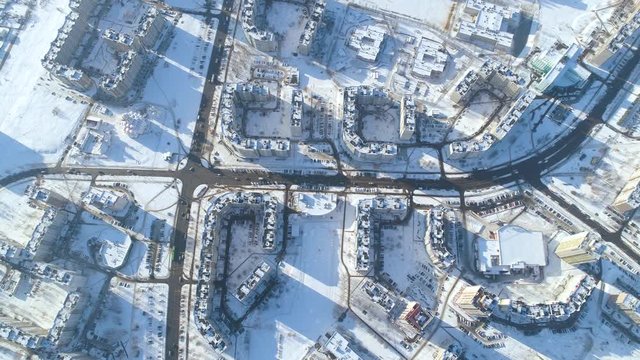 Winter drone shot of the Minsk city snow sunny day residential buildings from above aerial