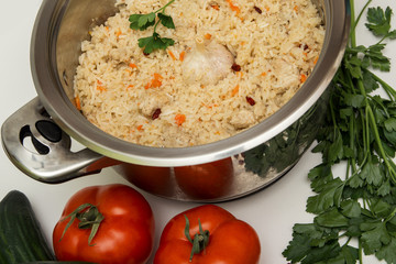 tasty plov and vegetables
