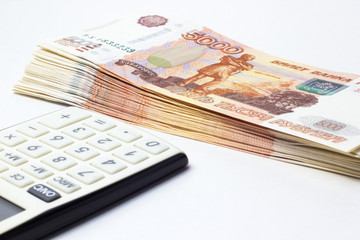 Lots of Money and a close-up calculator