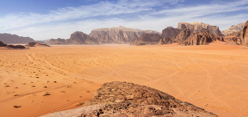 view to desert valley from peak in Jordan