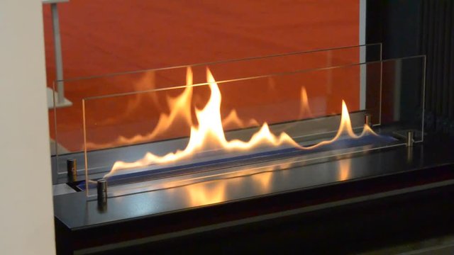 Modern bio fireplot fireplace on ethanol gas. Smart ecological alternative technologies. Contemporary biofuel on ethanol close-up. Energy saving innovation