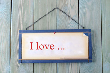 Obraz premium Wooden plaque with the inscription 