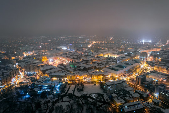 Winter night aerial view from Timisoara taken by a professional drone in the snow. Snow-covered historic center of the city © concept w