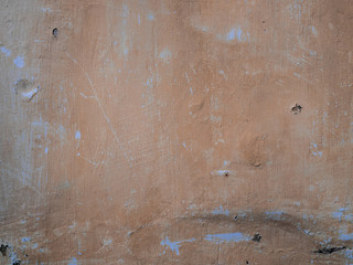 wall surface with old paint peeling off