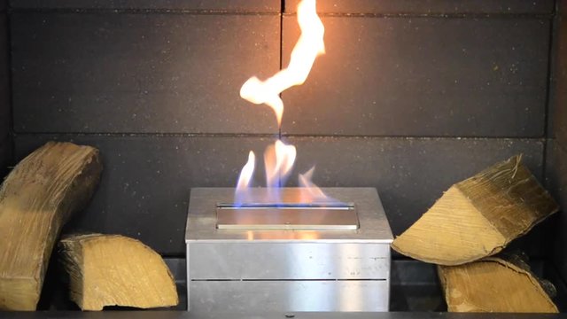 Modern bio fireplot fireplace on ethanol gas. Smart ecological alternative technologies. Contemporary biofuel on ethanol close-up. Energy saving innovation