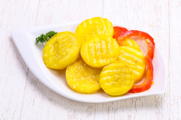 Pickled zucchini in the bowl