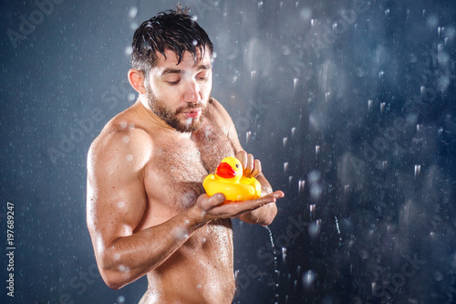 Naked men with a rubber ducky photo 149