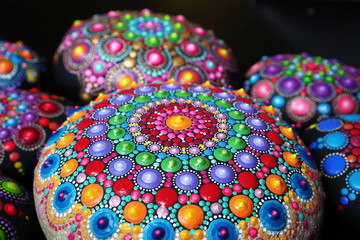 Mandala dot painting colorful stones