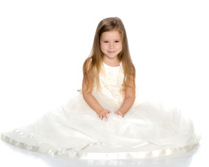 Fototapeta na wymiar Little princess in white dress