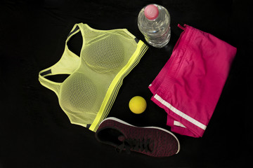Sport clothes on black background