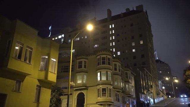 Low angle of buildings on a street at night