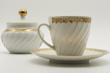 the old chinaware with golden texture