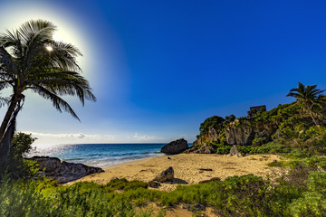 Mexico. The Mayan city of Tulum. There is beach - birthplace of sea turtles, beyond silhouettethe of the Castle