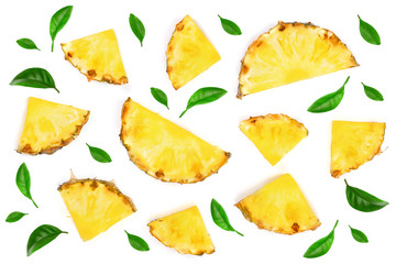 Sliced pineapple decorated with leaves isolated on white background. Top view. Flat lay pattern