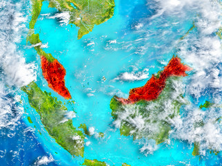 Fototapeta na wymiar Malaysia in red on Earth
