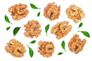 walnut kernels decorated with leaves isolated on white background. Top view. Flat lay