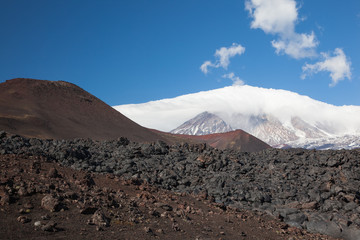 Volcano Tolbachik (flat) in Kamchatka in Russia . Field of clinker volcanic lava.
