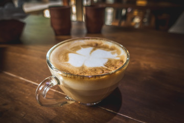 Close up coffee cup latte art.