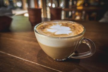Close up coffee cup latte art.