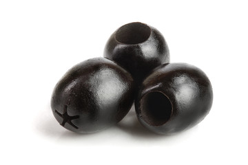 whole black olives isolated on white background macro