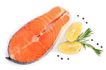 Slice of red fish salmon with lemon, rosemary and peppercorns isolated on white background. Top view. Flat lay