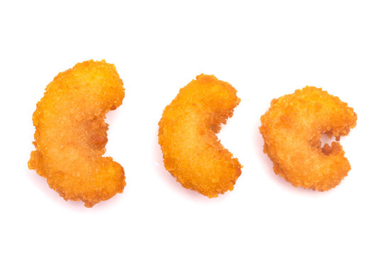 Battered and Fried Popcorn Shrimp on a White Background