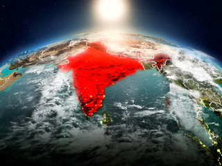 India in sunrise from orbit