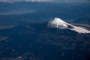 Aerial view of Mount Fuji volcano with a snow cap in Japan